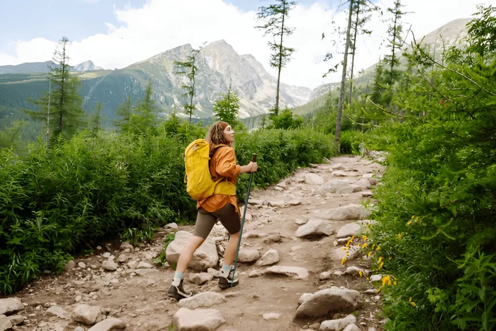 A Female Hiker with Trekking Pols