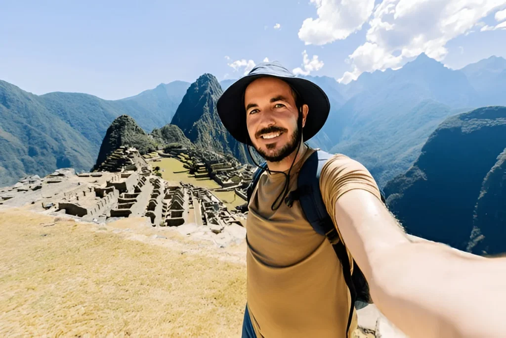 Happy young traveler man taking selfie portrait while enjoying vacation