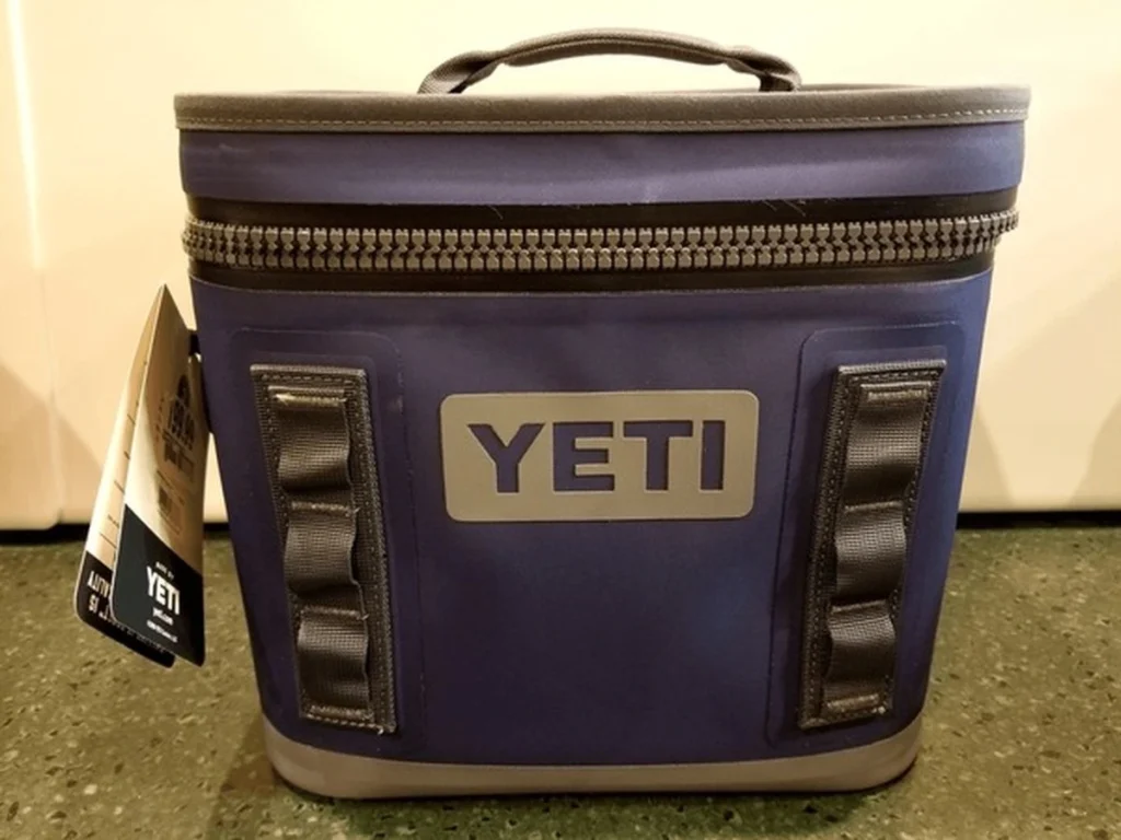 YETI soft cooler with a rugged zipper and carry handle, showcasing durable insulation and design often featured among the best soft coolers for camping and outdoor use.