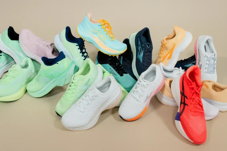 A colorful collection of top-rated athletic shoes arranged on a neutral background, showcasing options for the Best Running Shoes for Women