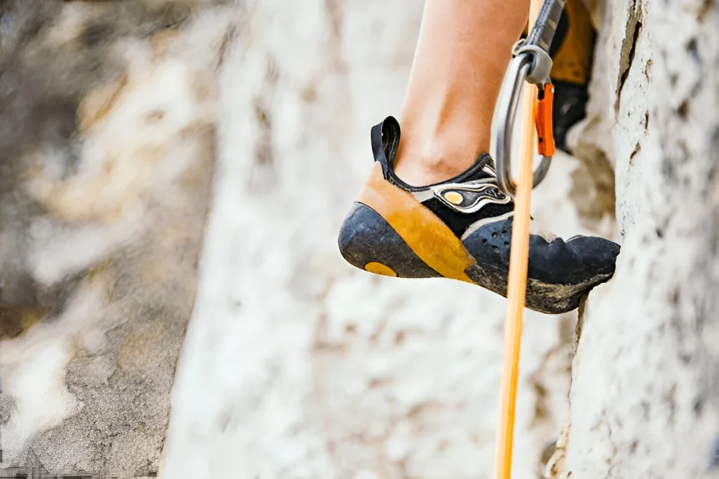 Best Climbing Shoes for Women in action on a rock face, offering strong grip, precision, and comfort for outdoor climbing performance.